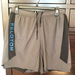 Like New! Mens medium grey Peloton Fourlaps athletic shorts.